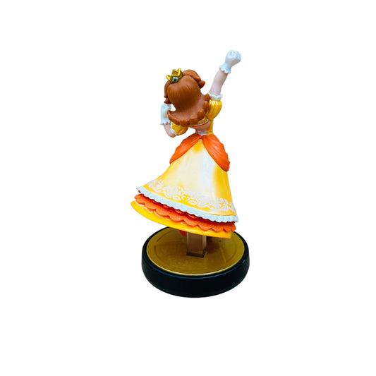 Figurine of a character in a colorful dress on a white background
