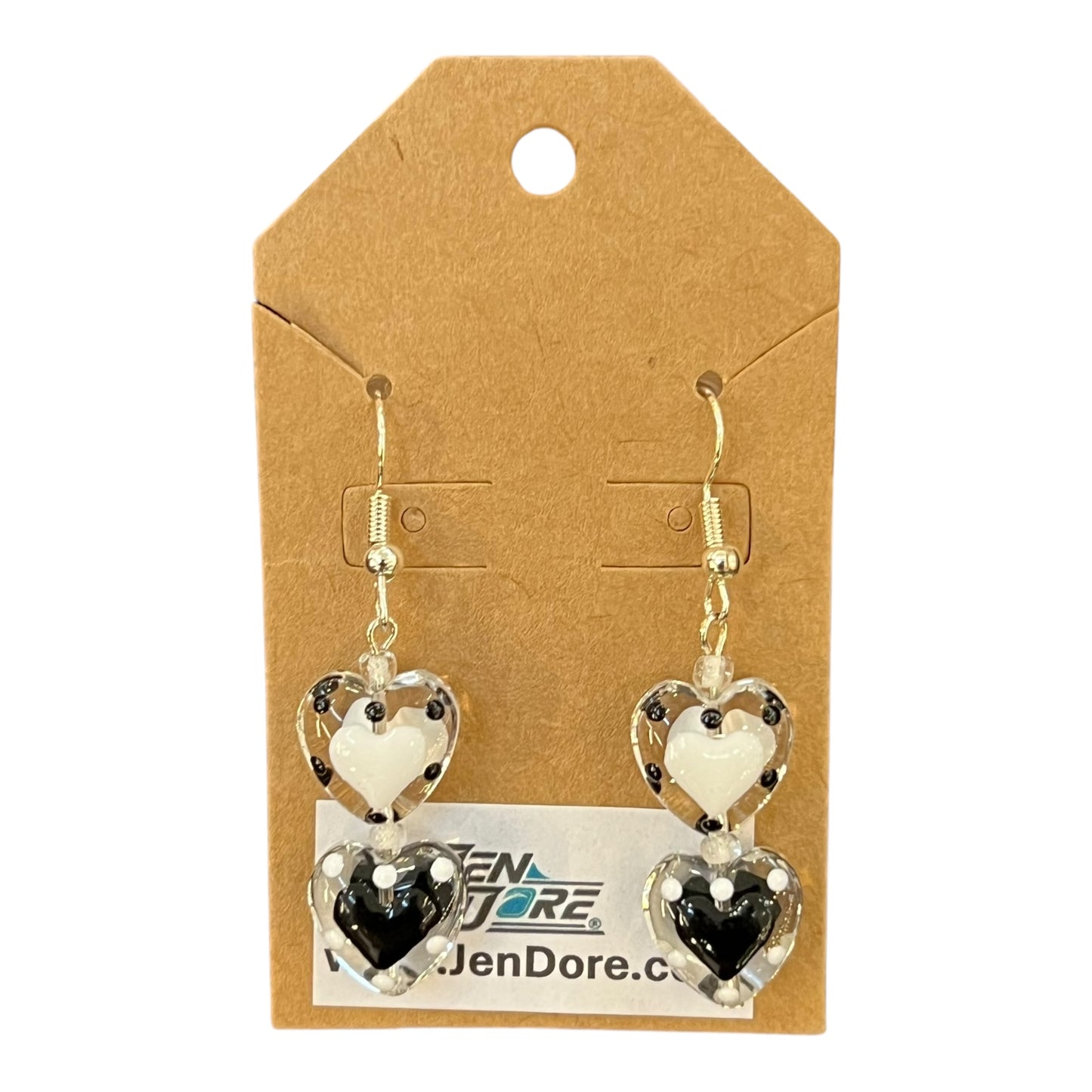 Heart-shaped earrings on a JenDore branded card