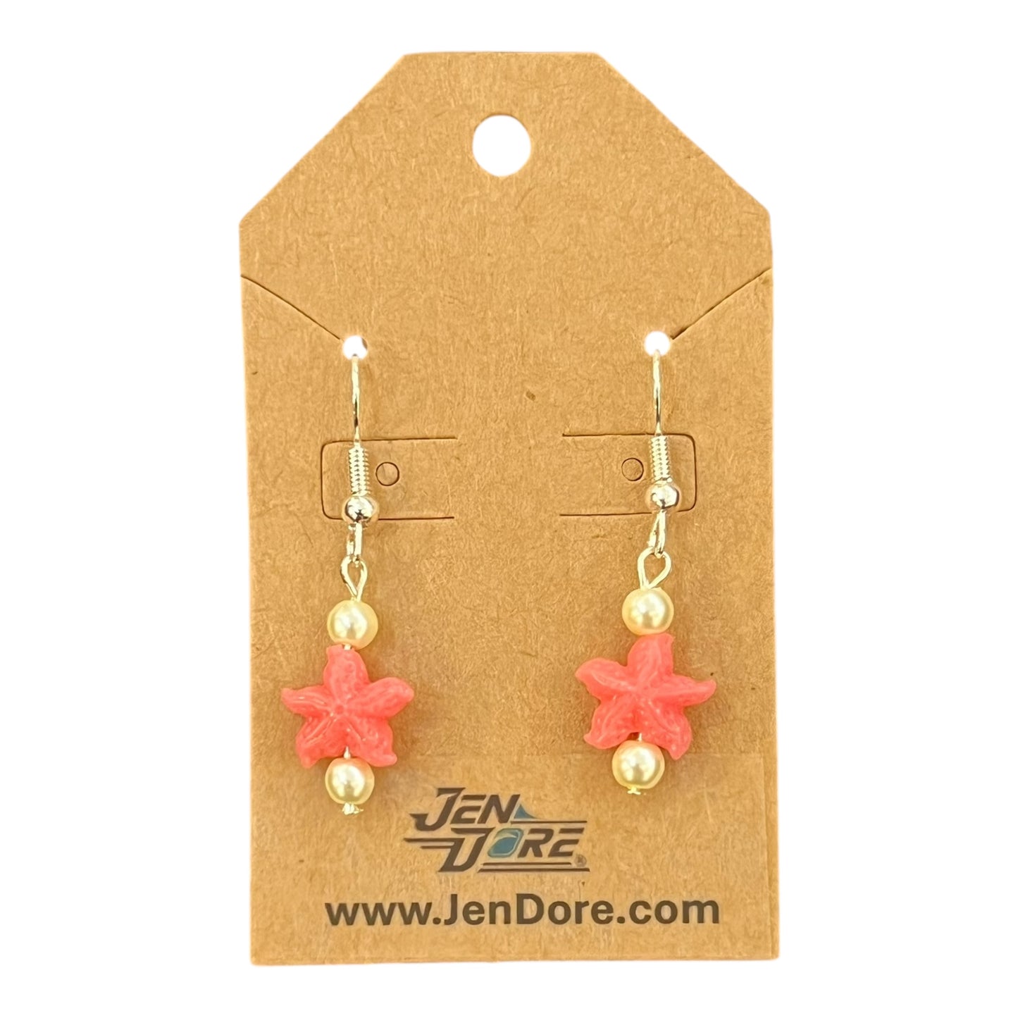 Starfish-shaped earrings on a JenDore branded card with a white background