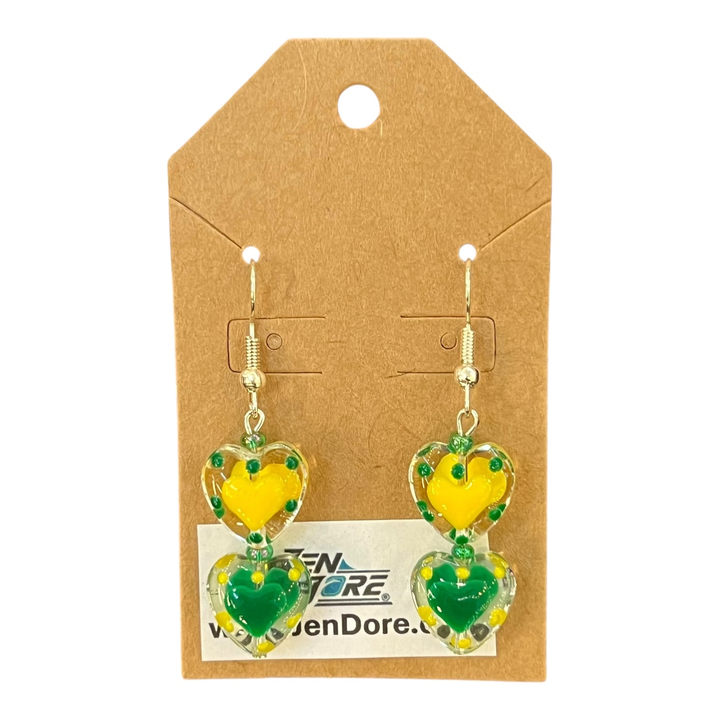 Heart-shaped earrings with yellow and green design on a brown card with JenDore branding.