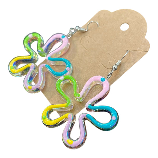 Close-up of JenDore colorful cartoon-style sky flower dangle earrings, showcasing vibrant handmade details and playful design.