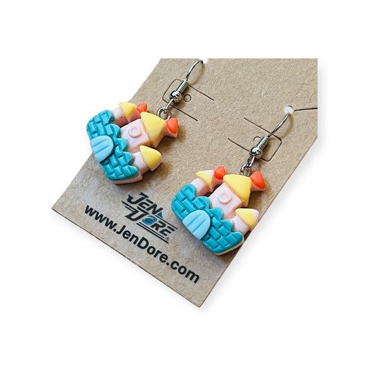 Close-up of JenDore handmade princess castle dangle earrings featuring whimsical fairytale-inspired charm and lightweight design.