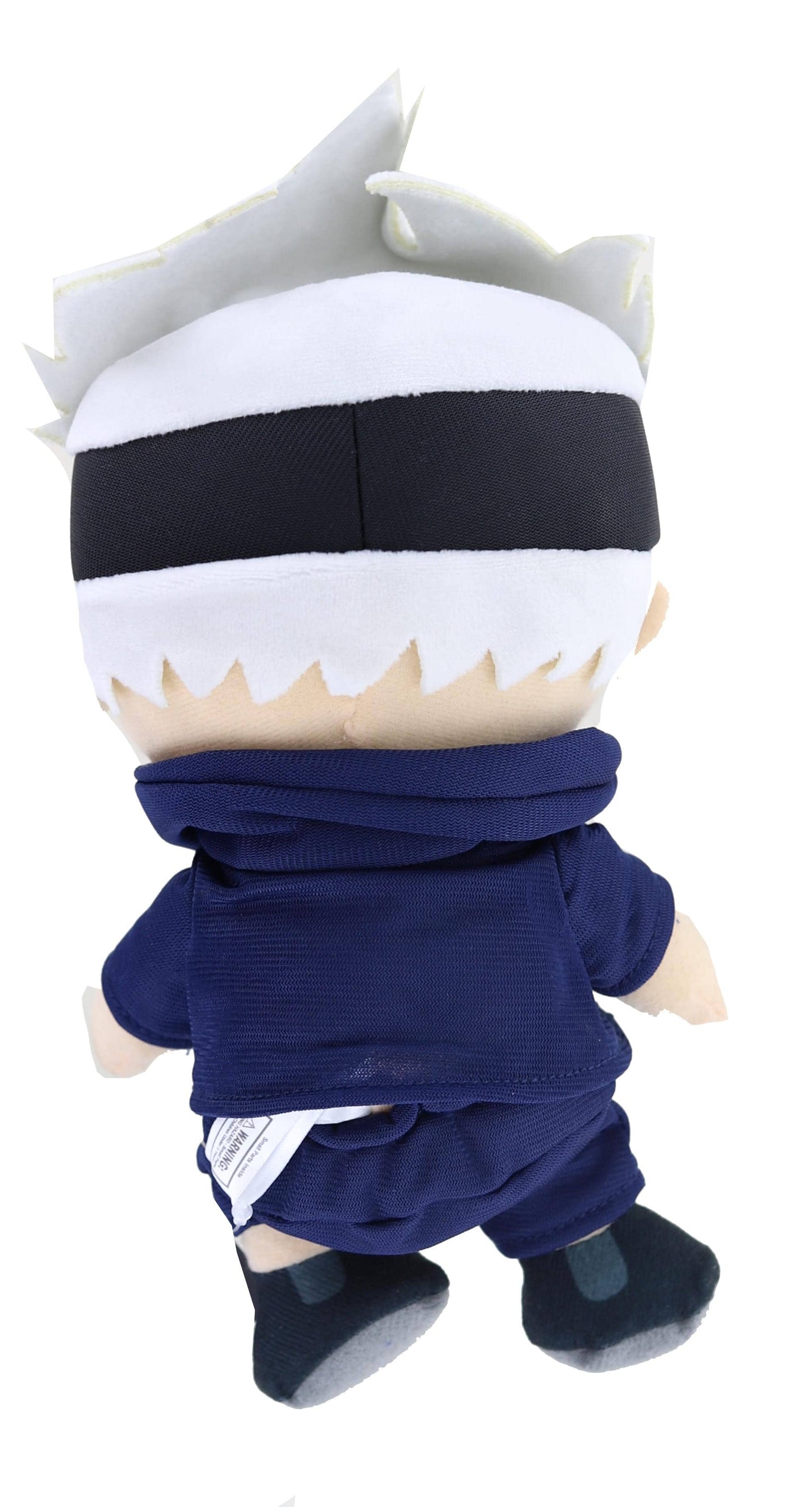 A plush toy doll shown from the back, featuring spiky white hair, a black headband, a navy blue high-neck top, matching navy shorts, and dark blue shoes, isolated on a white background.