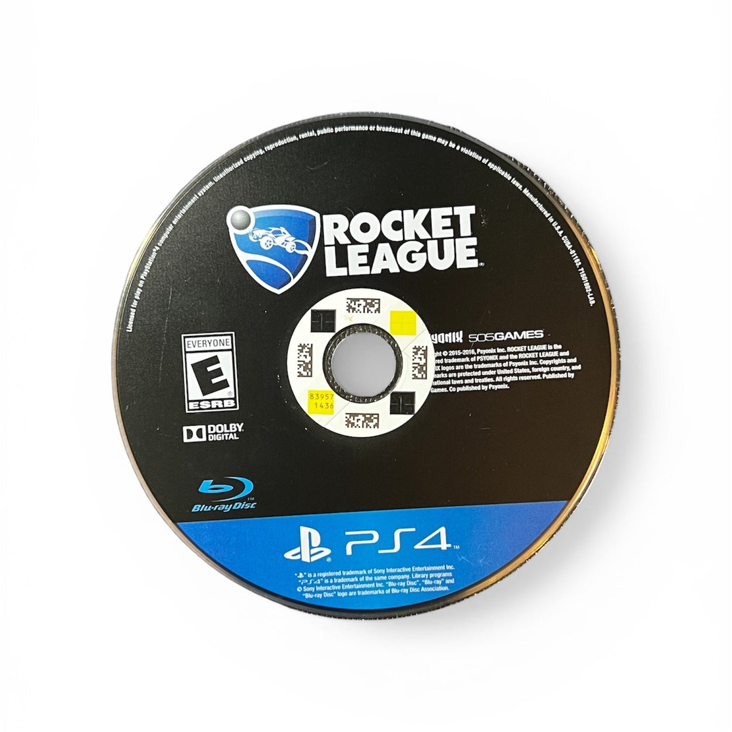 Game disc for 'Rocket League' on a PlayStation 4 console, featuring the ESRB rating.