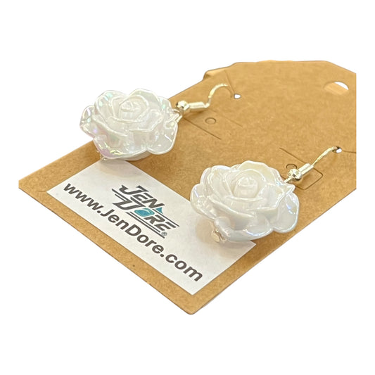 White rose earrings on a JenDore branded card with a white background