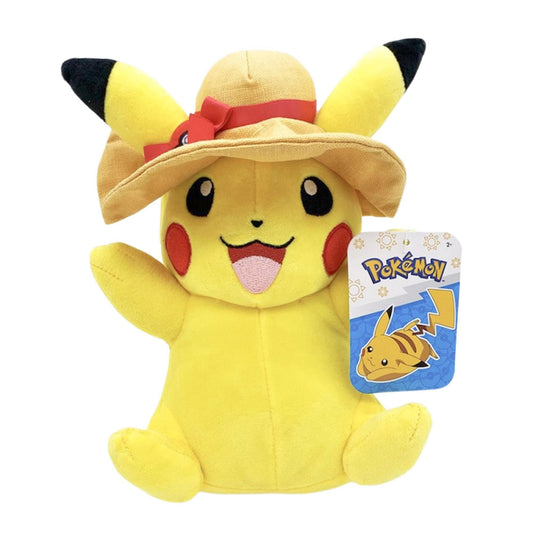 Plush toy of Pikachu wearing a sun hat with a Pokémon tag on a white background