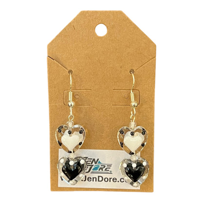 Heart-shaped earrings on a JenDore branded card