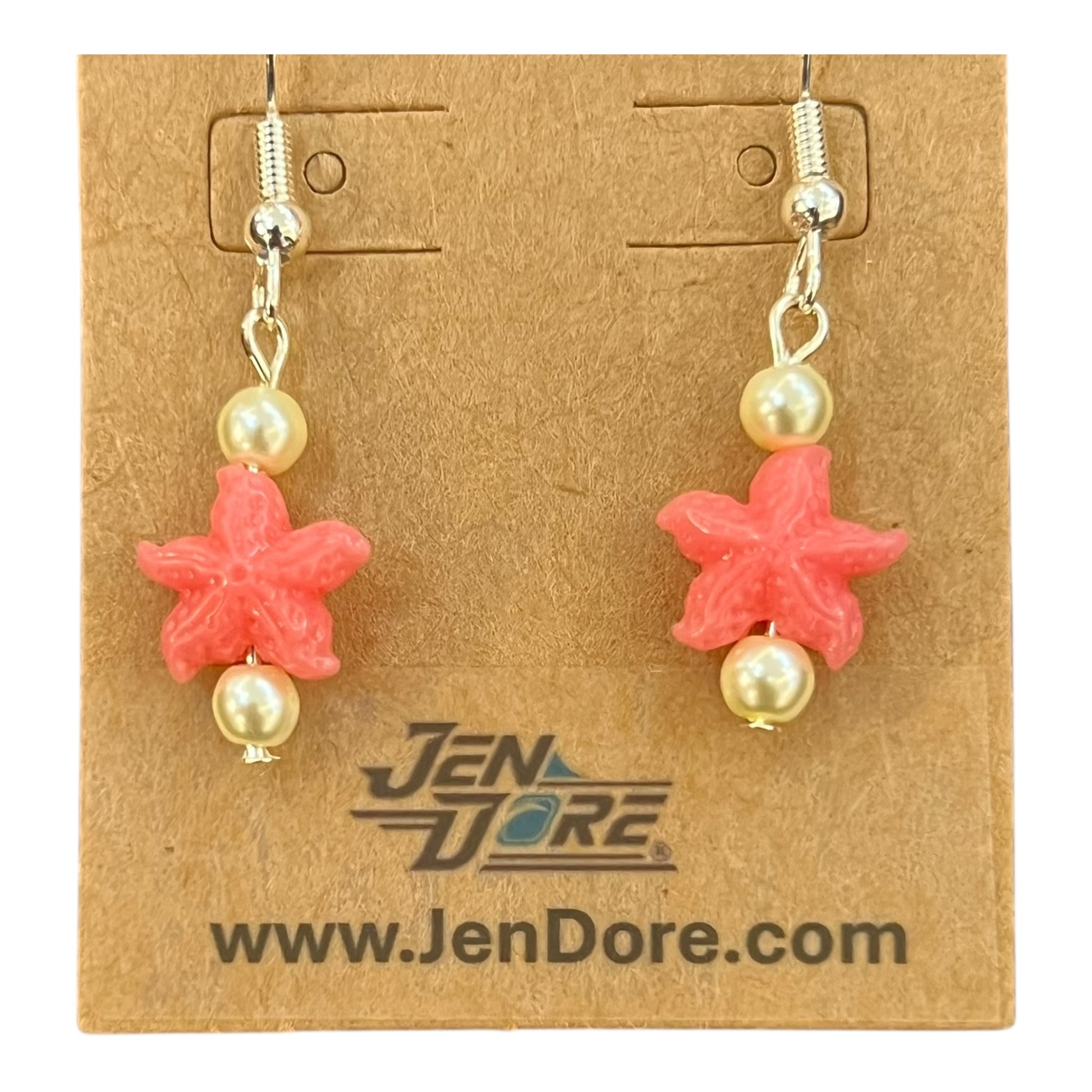 Starfish-shaped earrings with pearls on a JenDore branded card.