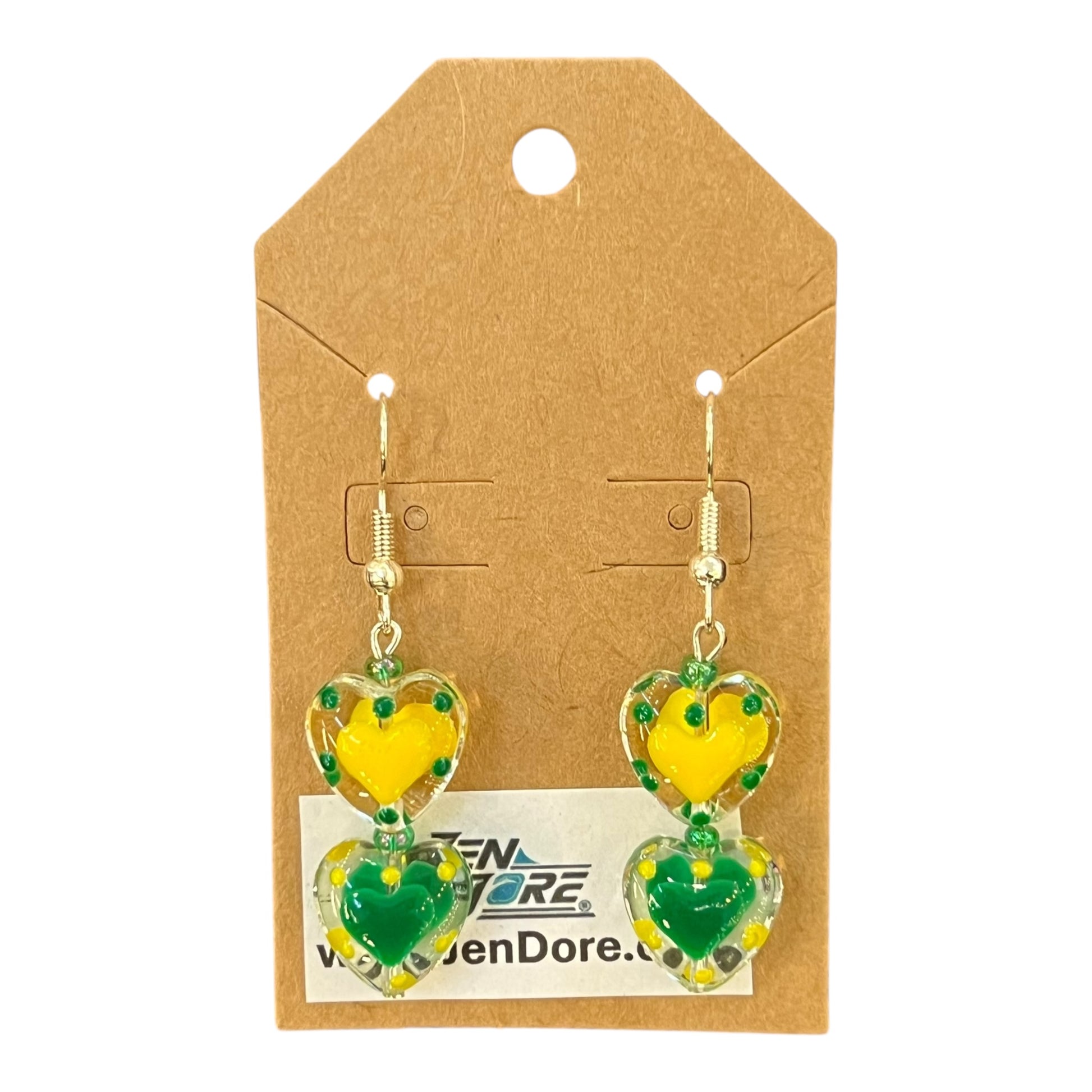 Heart-shaped earrings with yellow and green design on a brown card with JenDore branding.