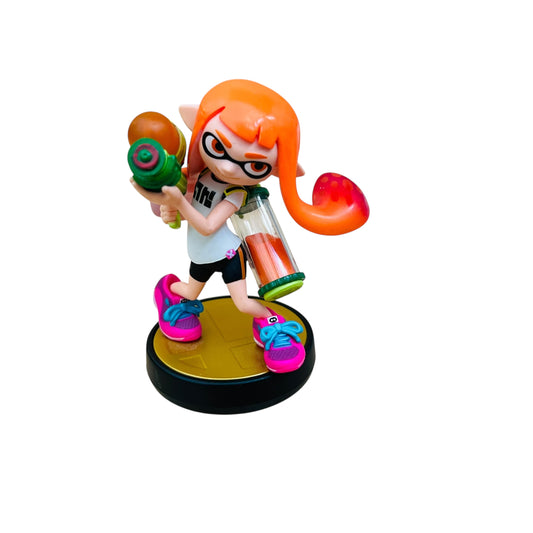 Colorful figurine with orange hair and glasses holding a colorful object on a white background