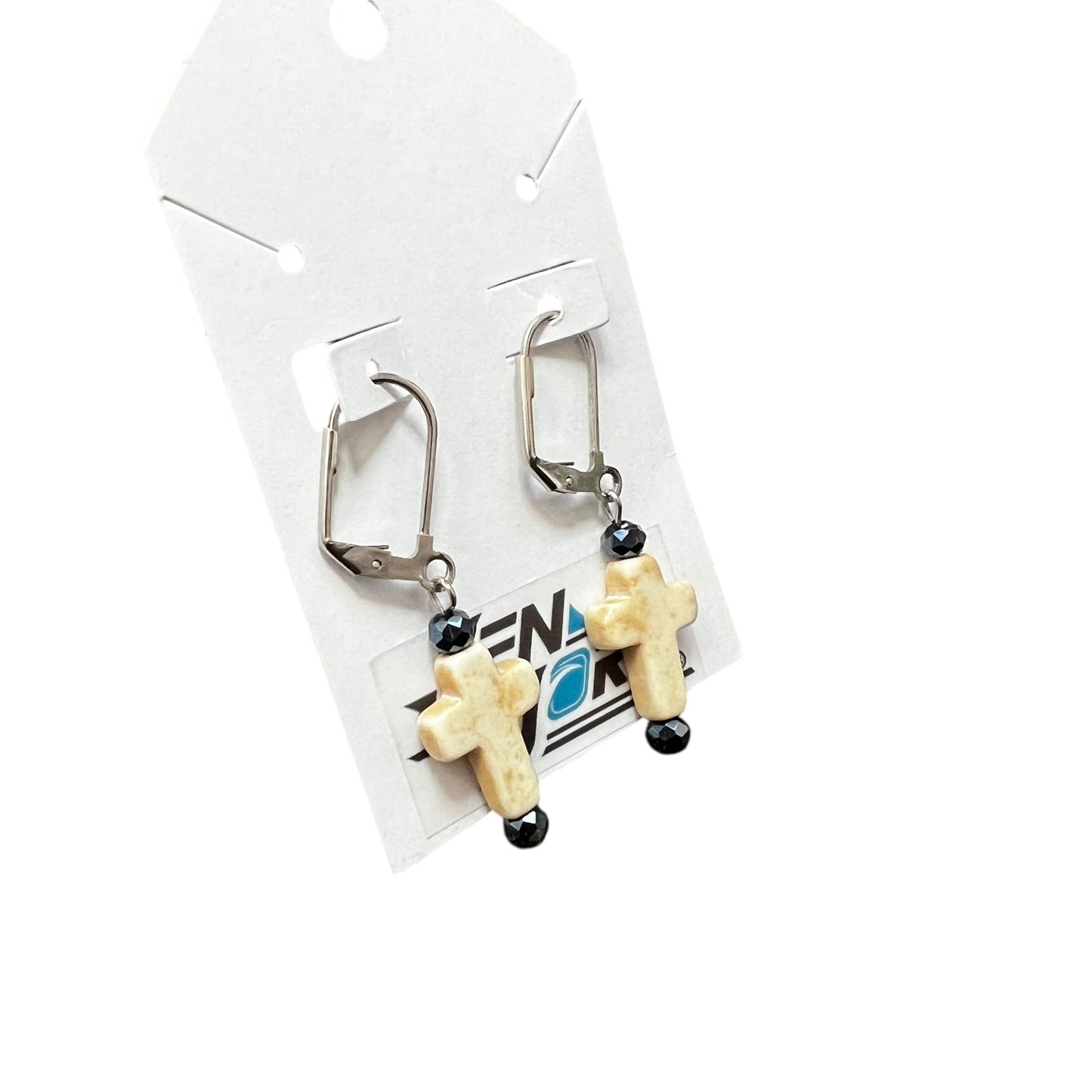 Handmade ivory cross earrings with midnight stone on stainless steel leverback hooks by JenDore