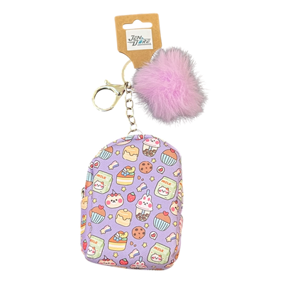 Keychain with pink pom-pom and patterned pouch on a white background