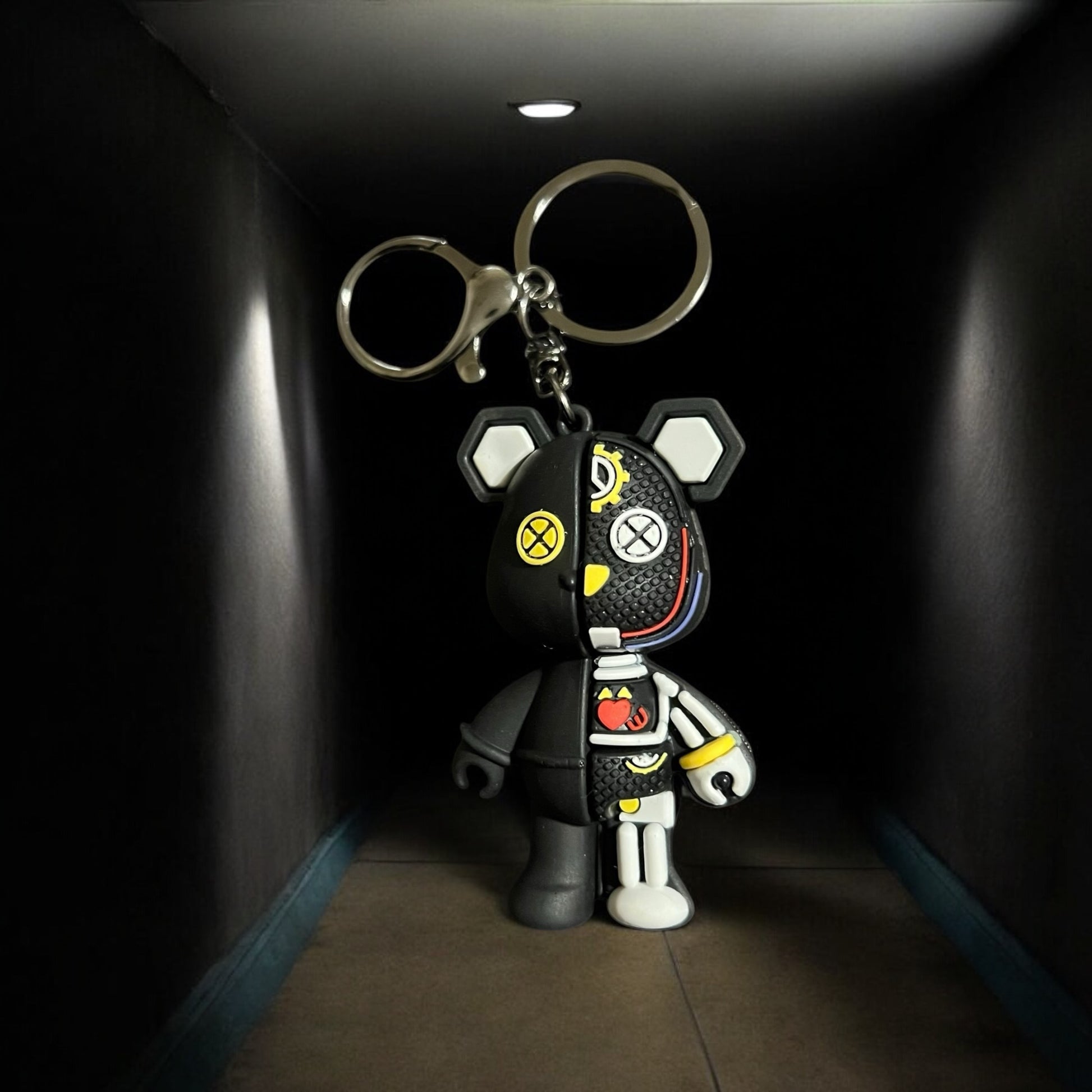 JenDore Mecha Bear Keychain made of silicone with half teddy and half cyborg design