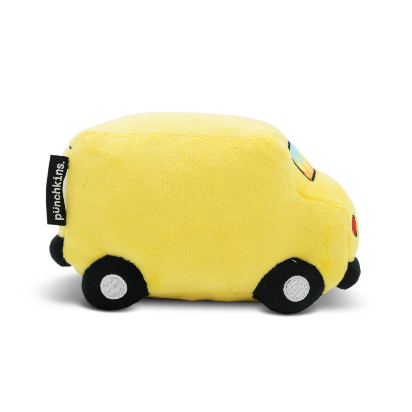 Yellow plush toy car with a visible brand tag on a white background