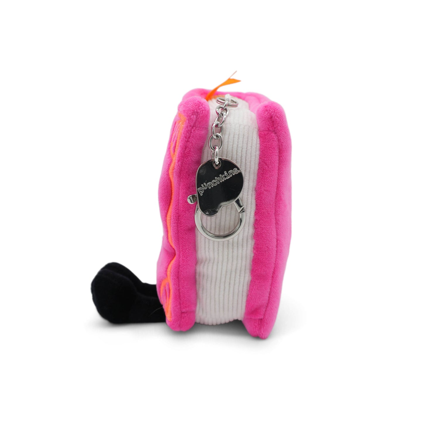 Pink plush toy with a keychain on a white background