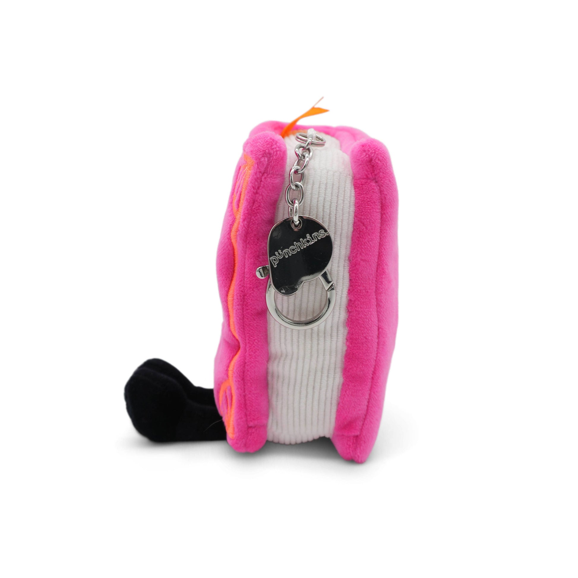Pink plush toy with a keychain on a white background